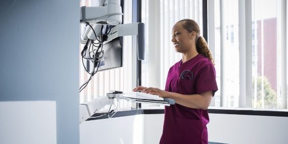 Female nurse on hospital computer